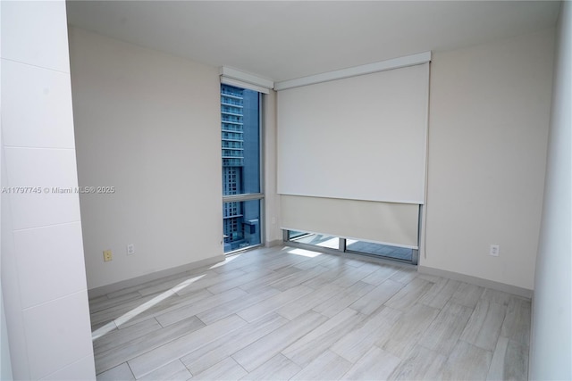 1010 SW 2nd Ave Unit 1703, Miami, FL 33130 - empty room featuring wood finished floors