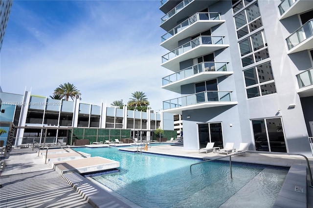 1010 SW 2nd Ave Unit 1703, Miami, FL 33130 - community pool featuring a patio