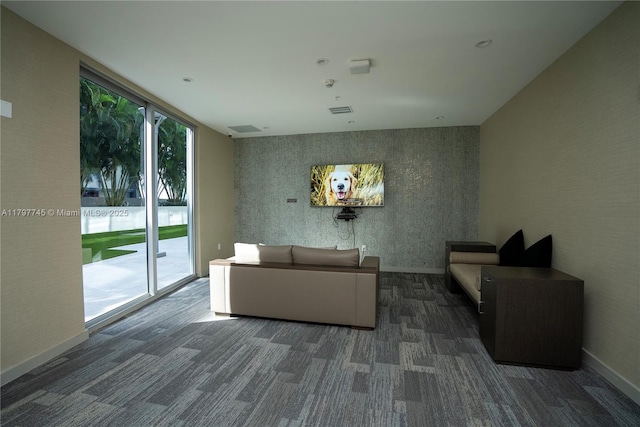 1010 SW 2nd Ave Unit 1703, Miami, FL 33130 - carpeted living room featuring visible vents and baseboards