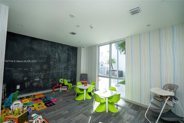 1010 SW 2nd Ave Unit 1703, Miami, FL 33130 - game room with carpet flooring and visible vents