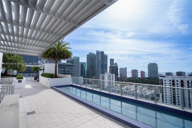 1010 SW 2nd Ave Unit 1703, Miami, FL 33130 - view of swimming pool featuring a view of city and a pergola