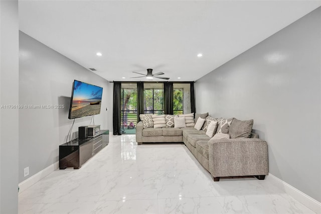 living room with marble finish floor, baseboards, a ceiling fan, and recessed lighting