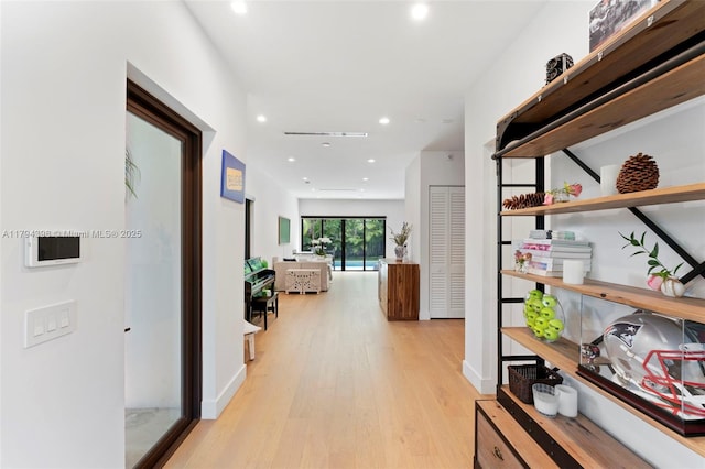 3132 Plaza St, Miami, FL 33133 - corridor with light wood-style floors and recessed lighting