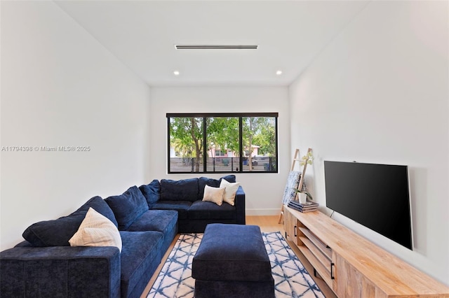 3132 Plaza St, Miami, FL 33133 - living room featuring light wood finished floors, recessed lighting, and baseboards
