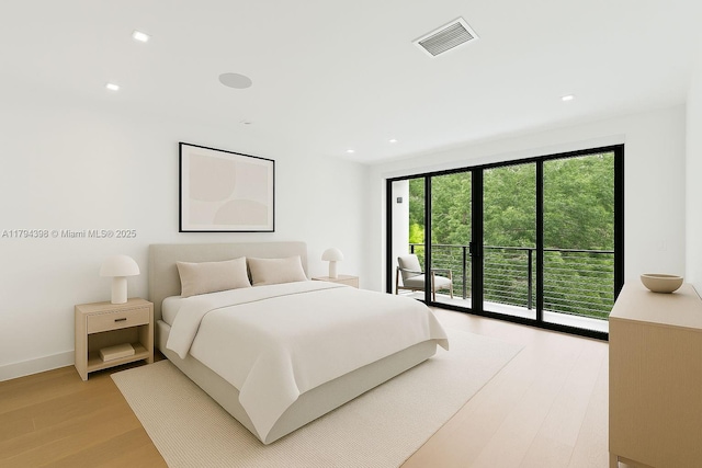 3132 Plaza St, Miami, FL 33133 - bedroom with access to exterior, light wood-style flooring, recessed lighting, and baseboards