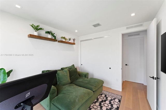 3132 Plaza St, Miami, FL 33133 - living room featuring light wood-type flooring and recessed lighting