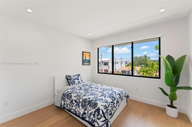 3132 Plaza St, Miami, FL 33133 - bedroom with baseboards, wood finished floors, and recessed lighting