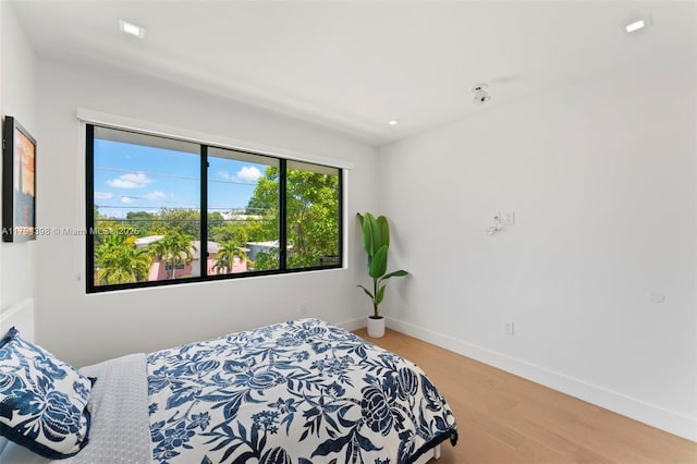 3132 Plaza St, Miami, FL 33133 - bedroom featuring light wood-type flooring, baseboards, and recessed lighting