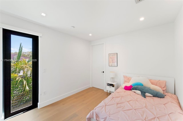3132 Plaza St, Miami, FL 33133 - bedroom with light wood finished floors, recessed lighting, and baseboards