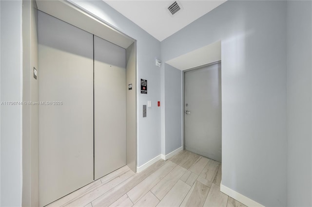 480 NE 31st St Unit 4307, Miami, FL 33137 - corridor featuring baseboards, elevator, and visible vents