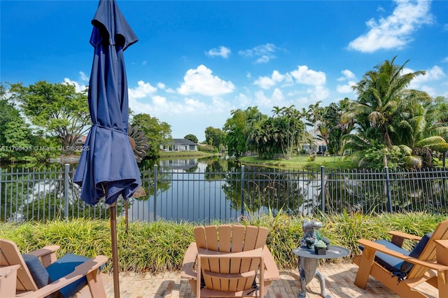 610 Lake Dasha Cir, Plantation, FL 33324 - view of patio / terrace with a water view