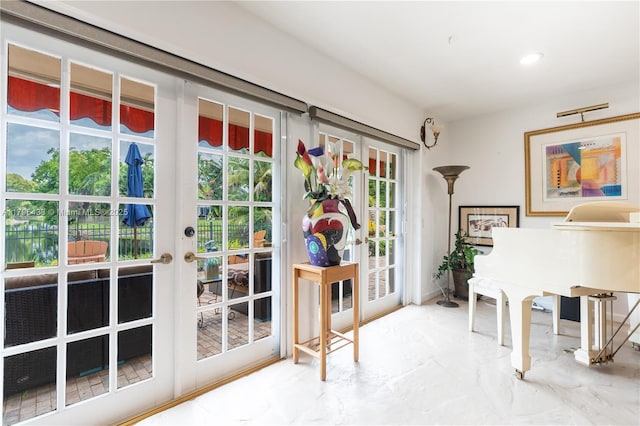 610 Lake Dasha Cir, Plantation, FL 33324 - doorway featuring french doors, marble finish flooring, and recessed lighting