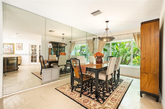 610 Lake Dasha Cir, Plantation, FL 33324 - dining space with marble tiled floors and plenty of natural light
