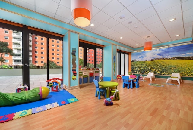 1581 Brickell Ave Unit Ph102, Miami, FL 33129 - playroom featuring wood finished floors and recessed lighting