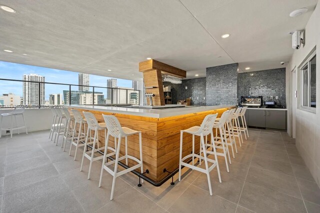 227 NE 2nd St Unit 2908, Miami, FL 33132 - kitchen with a breakfast bar and a city view