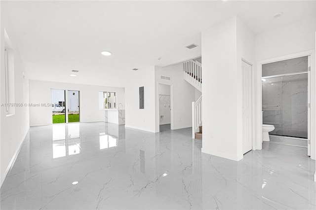 unfurnished living room with stairway, marble finish floor, baseboards, and recessed lighting