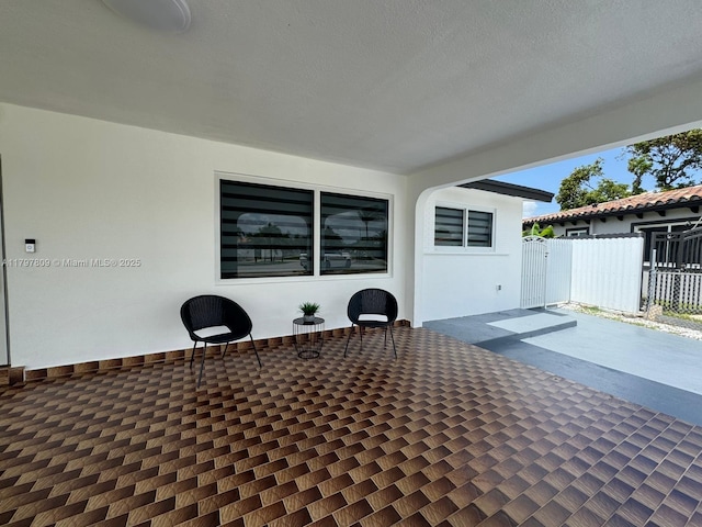 view of patio / terrace with fence