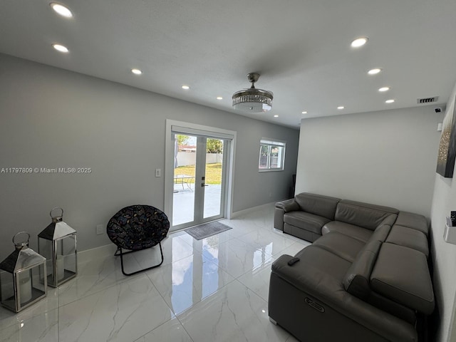 living room featuring french doors, marble finish floor, baseboards, and recessed lighting