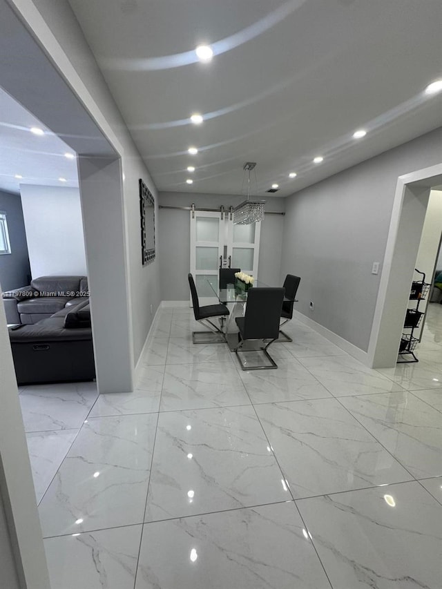 dining space featuring marble finish floor, baseboards, and recessed lighting
