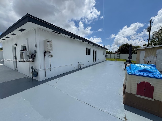 view of home's exterior featuring a patio