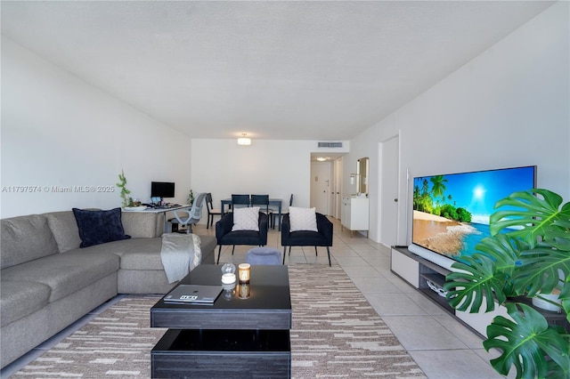 5838 Collins Ave Unit 10E, Miami Beach, FL 33140 - living area with tile patterned flooring