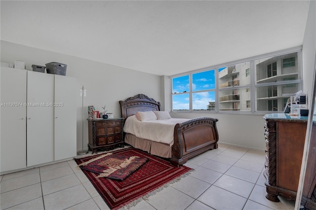 5838 Collins Ave Unit 10E, Miami Beach, FL 33140 - bedroom featuring light tile patterned floors
