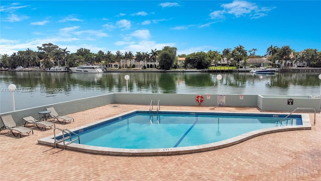 5838 Collins Ave Unit 10E, Miami Beach, FL 33140 - community pool with a patio and a water view