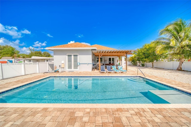 207 SW 11th St, Dania Beach, FL 33004 - view of pool with a pergola, a patio area, and a fenced backyard
