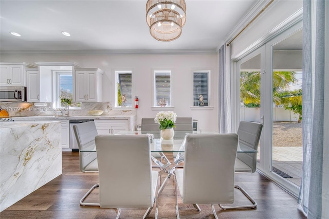 207 SW 11th St, Dania Beach, FL 33004 - dining room featuring crown molding, dark wood-type flooring, a chandelier, and recessed lighting