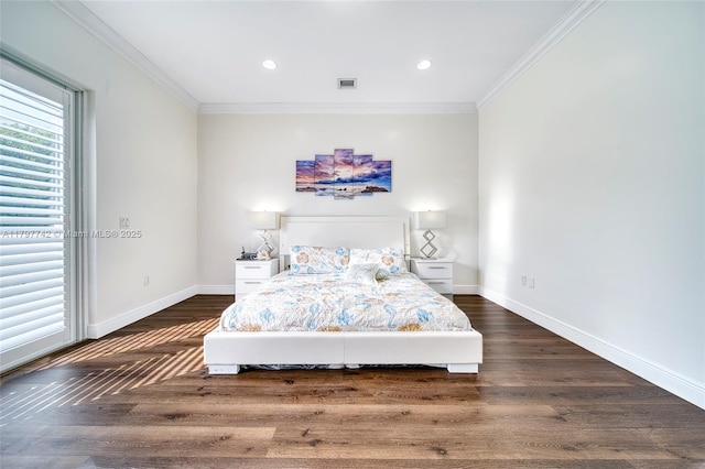 207 SW 11th St, Dania Beach, FL 33004 - bedroom with crown molding, baseboards, visible vents, and wood finished floors