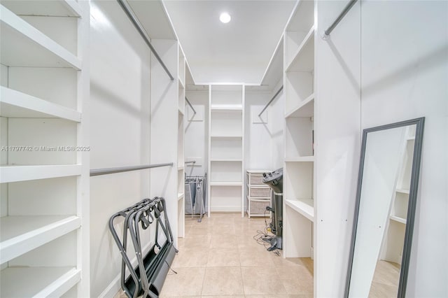 207 SW 11th St, Dania Beach, FL 33004 - spacious closet with light tile patterned flooring