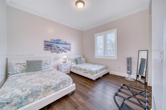 207 SW 11th St, Dania Beach, FL 33004 - bedroom with ornamental molding, wood finished floors, and baseboards