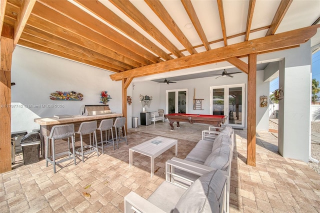 207 SW 11th St, Dania Beach, FL 33004 - view of patio featuring exterior bar, ceiling fan, outdoor lounge area, and french doors