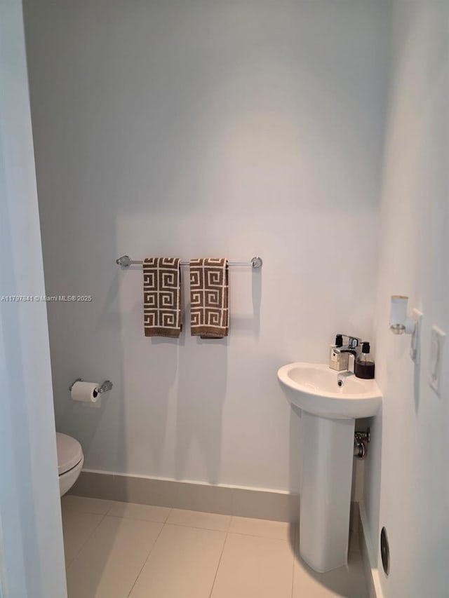 501 NE 31st St Unit 2802, Miami, FL 33137 - half bath featuring toilet and tile patterned floors