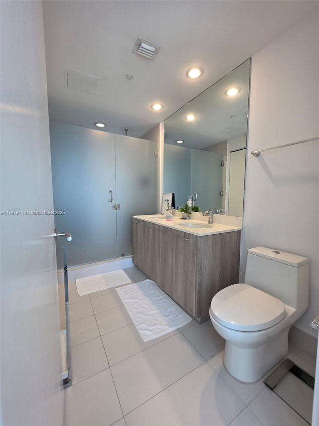 501 NE 31st St Unit 2802, Miami, FL 33137 - full bath featuring a stall shower, double vanity, recessed lighting, and tile patterned floors