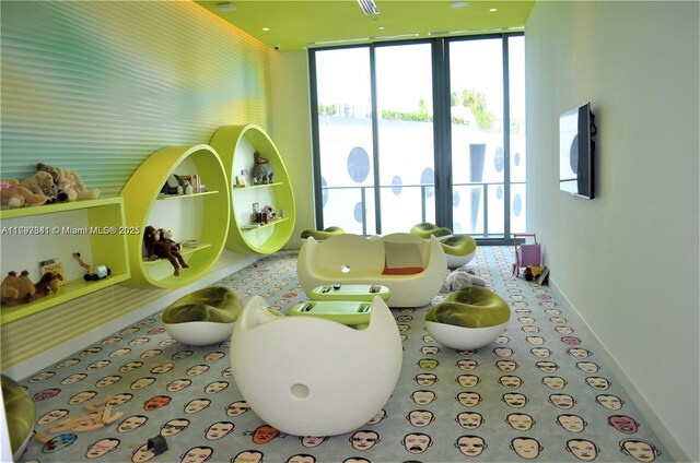 501 NE 31st St Unit 2802, Miami, FL 33137 - playroom with baseboards