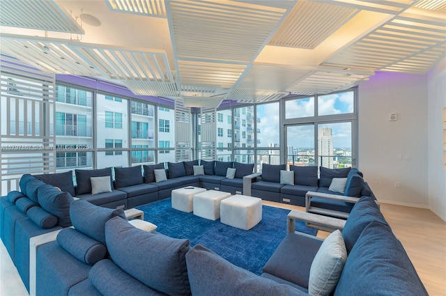 227 NE 2nd St Unit 2508, Miami, FL 33132 - living area with a city view, baseboards, and wood finished floors