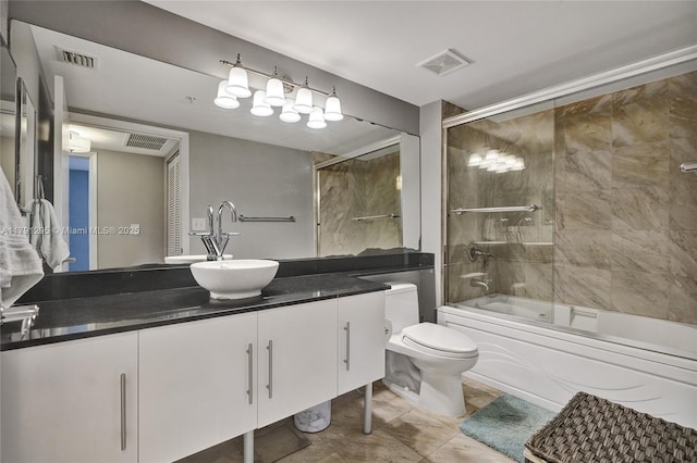 31 SE 5th St Unit 1505, Miami, FL 33131 - full bathroom with toilet, visible vents, vanity, and combined bath / shower with glass door