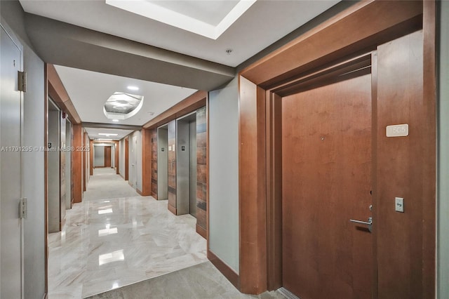 31 SE 5th St Unit 1505, Miami, FL 33131 - corridor featuring elevator and marble finish floor