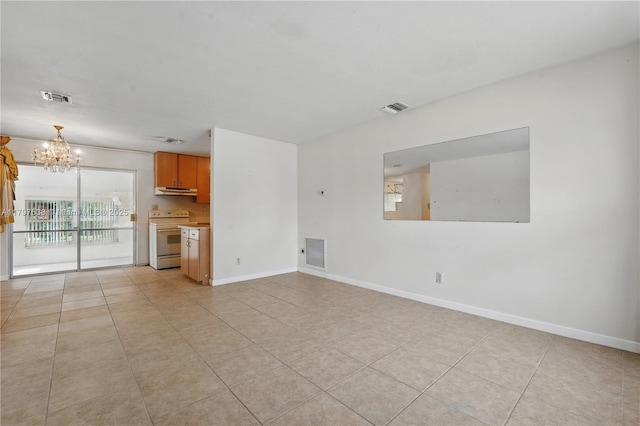 3460 NW 17th St, Lauderhill, FL 33311 - unfurnished living room featuring an inviting chandelier, light tile patterned floors, and visible vents