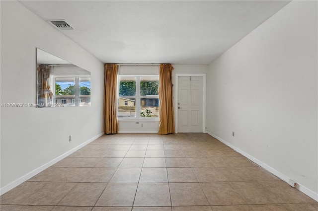 3460 NW 17th St, Lauderhill, FL 33311 - spare room featuring light tile patterned floors, baseboards, and visible vents