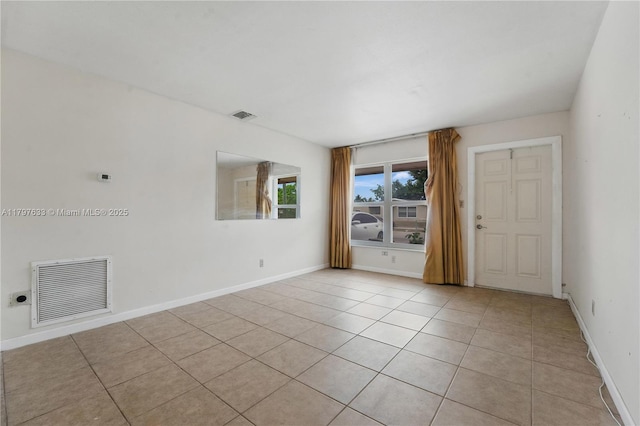 3460 NW 17th St, Lauderhill, FL 33311 - unfurnished room featuring baseboards, visible vents, and light tile patterned flooring