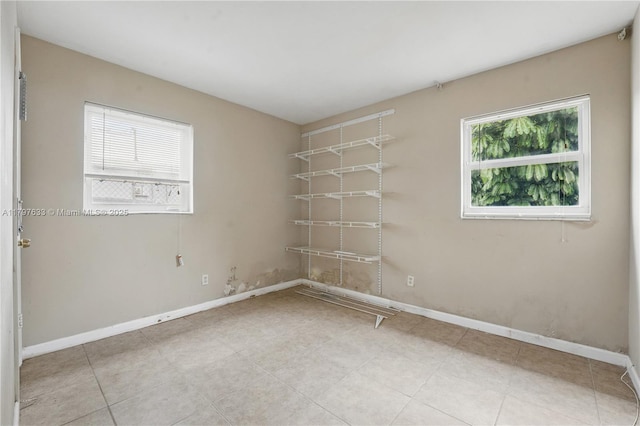 3460 NW 17th St, Lauderhill, FL 33311 - spare room featuring baseboards and light tile patterned floors
