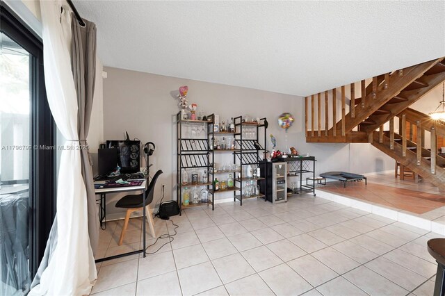 office area with light tile patterned flooring
