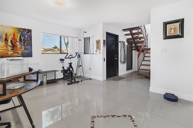 exercise area with baseboards