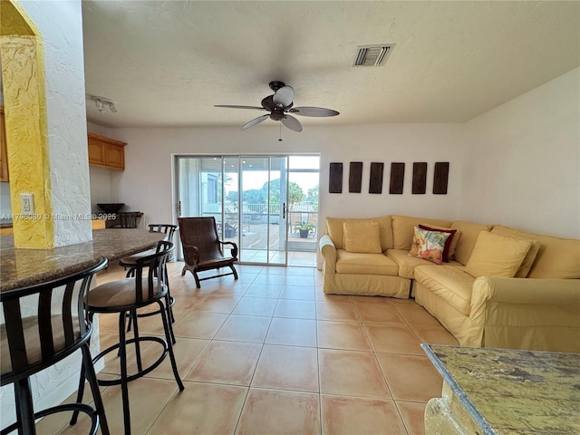 1700 Pierce St Unit 202, Hollywood, FL 33020 - living room featuring a ceiling fan and light tile patterned floors