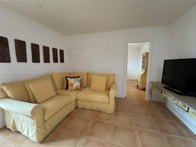 living area featuring light tile patterned floors