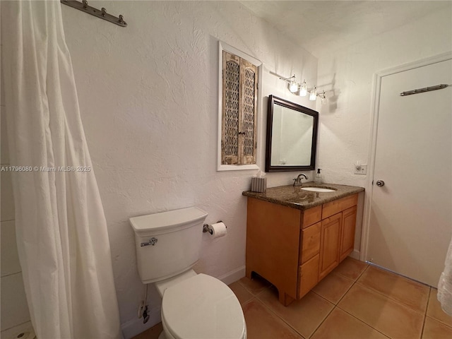 1700 Pierce St Unit 202, Hollywood, FL 33020 - bathroom with vanity, toilet, tile patterned flooring, and curtained shower