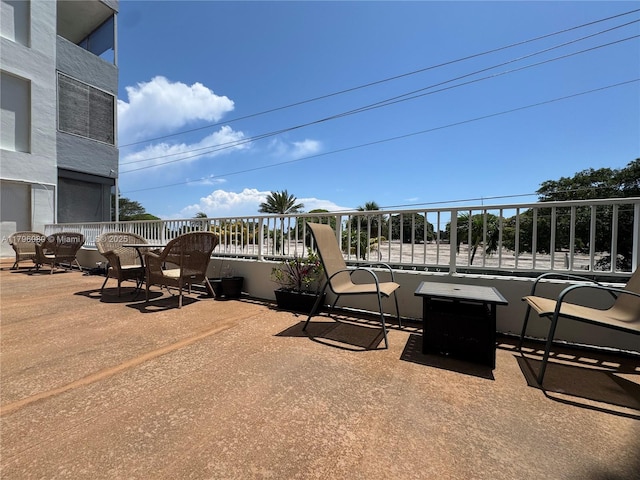 view of patio / terrace with a balcony