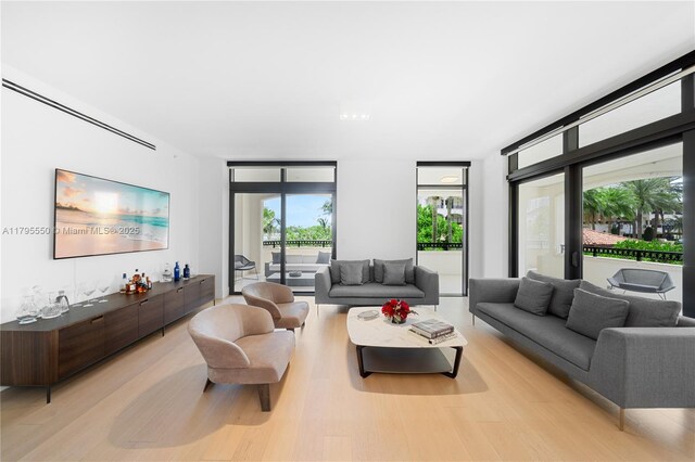 7025 Fisher Island Dr Unit 7025, Miami Beach, FL 33109 - living area featuring light wood-style floors